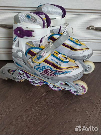 Роликовые коньки