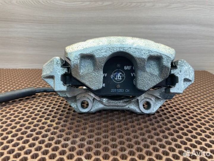 Суппорт тормозной передний правый Skoda Rapid