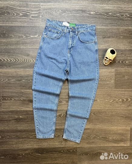 Джинсы Lacoste