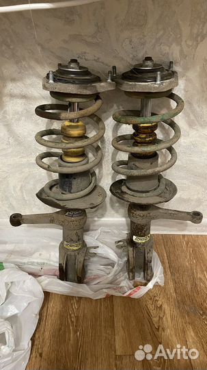 Передние стойки aston в сборе