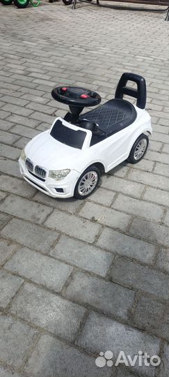 Детская машинка каталка bmw