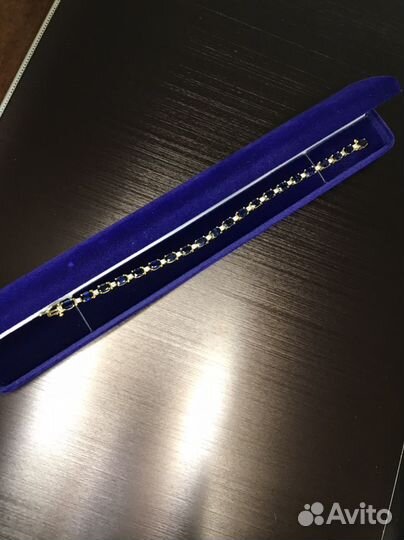 Золотой браслет с синими сапфирами