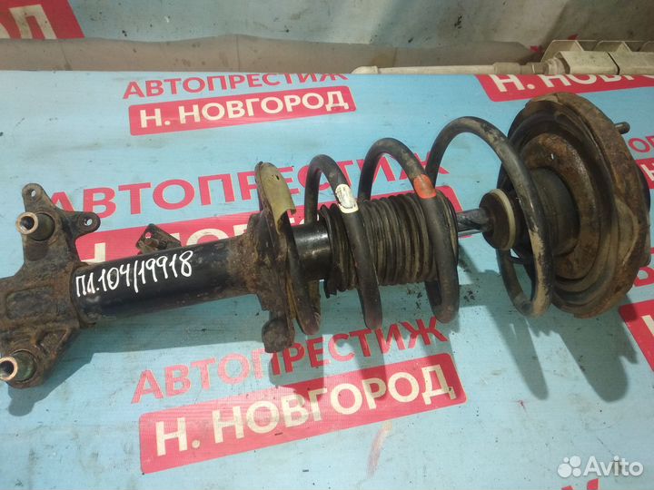 Стойка передняя левая Ниссан Премьера P12