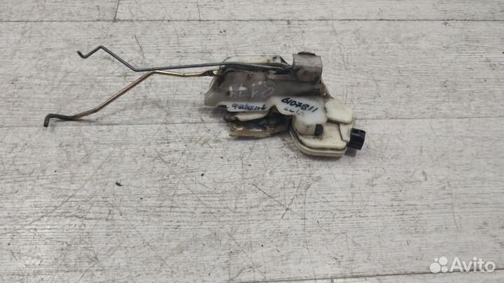 Замок двери передней левой Mitsubishi Galant 8 EA