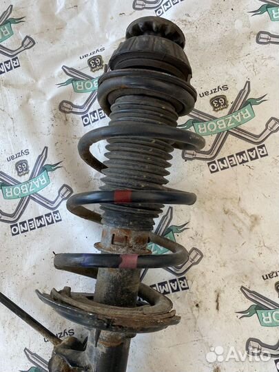 Стойка передняя левая Kia Rio III