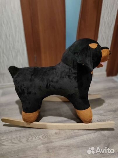 Собака качалка