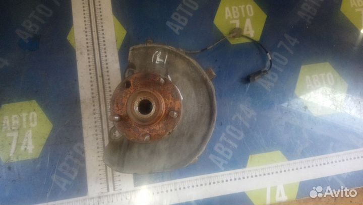 Кулак поворотный передний левый Mitsubishi Lance