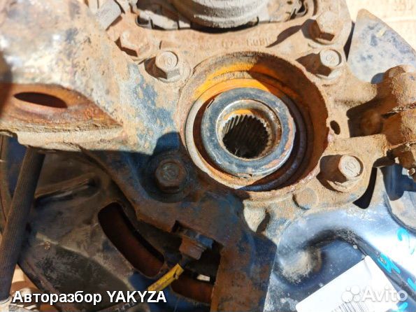 Кулак Киа Спортейдж 4 левый поворотный