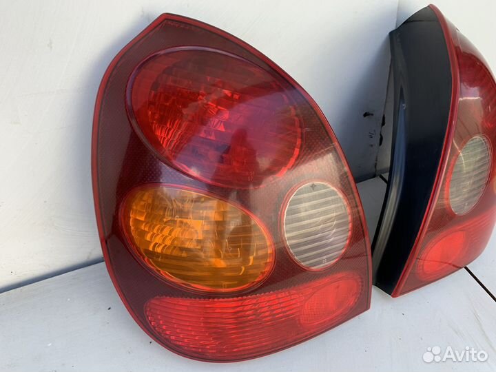 Фонарь левый Toyota Corolla E110 хэтчбек