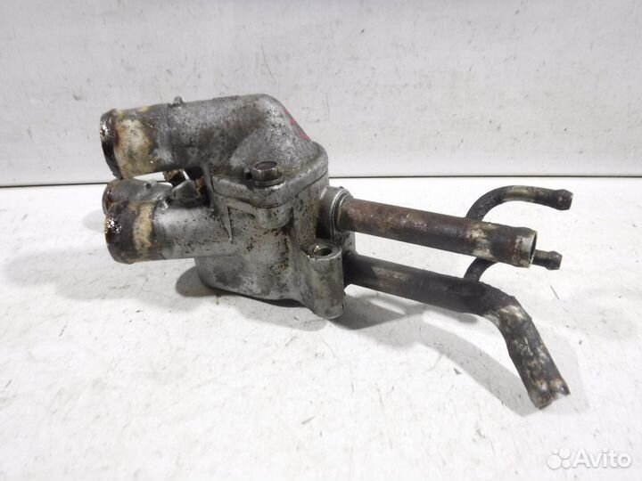 Корпус термостата Hyundai Lantra II