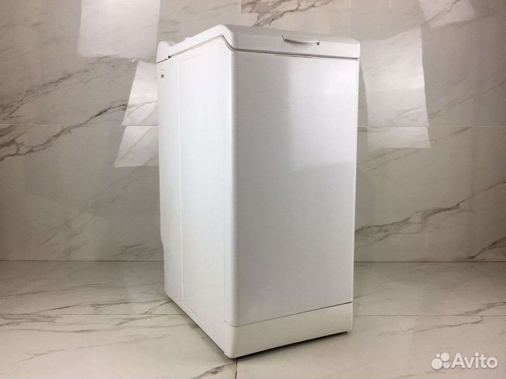 Стиральная машина с вертикальной загрузкой