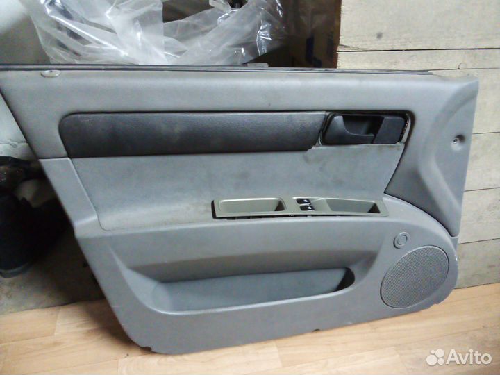 Обшивка передней левой двери Chevrolet Lacetti