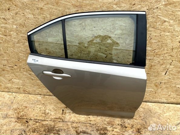 Стекло двери заднее правое Toyota Corolla E210