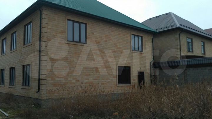 Дом 411,6 м² на участке 12 сот.