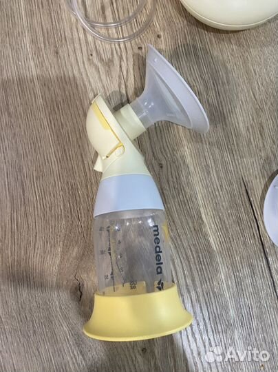 Молокоотсос medela электрический