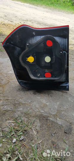 Фара задняя левая Toyota Corolla E120 хетчбек