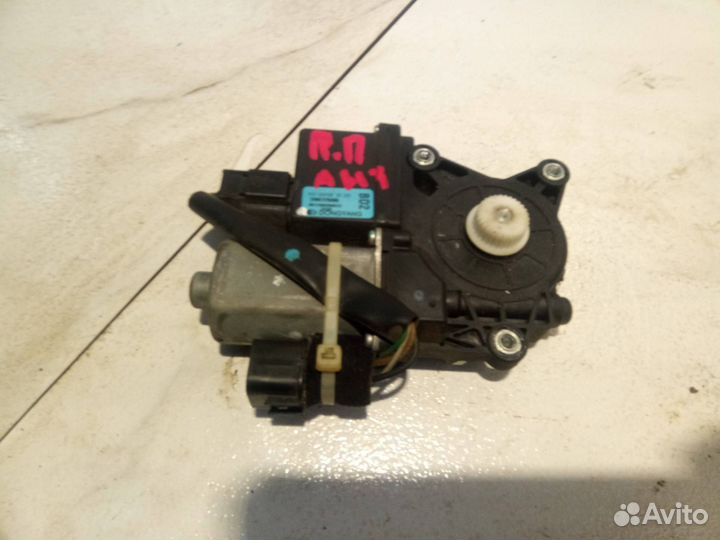 Моторчик стеклоподъемника передний правый Opel