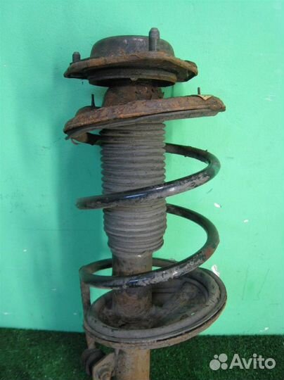 Стойка амортизатора передняя левая KIA Cerato (LD