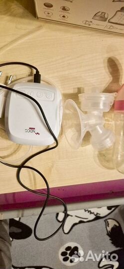 Молокоотсос электрический
