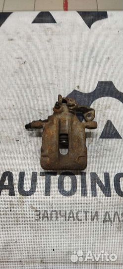 Суппорт задний правый VW Passat B3 7M0615424