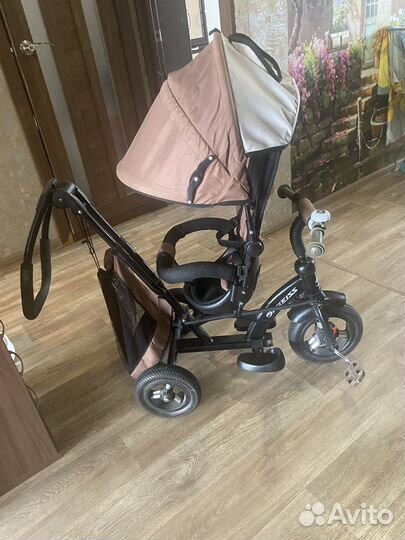 Трехколесный велосипед с ручкой