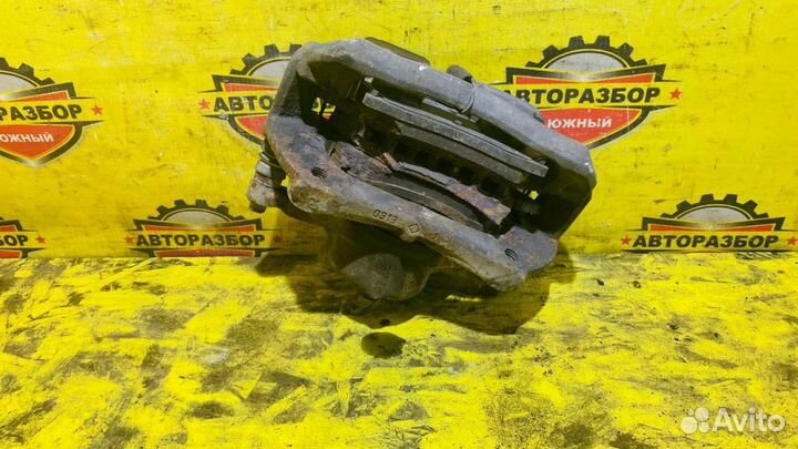 Суппорт передний левый Opel Astra J