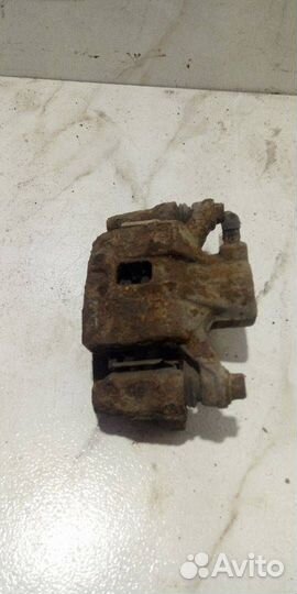 Суппорт тормозной задний левый Mitsubishi