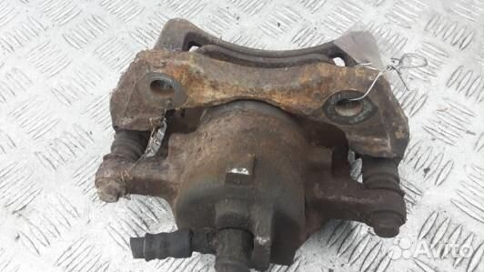 Суппорт тормозной передний правый nissan almera N1