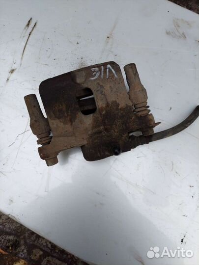 Суппорт задний левый Митсубиси Лансер 9 1.6 л