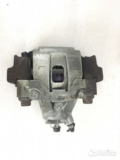 Суппорт тормозной задний левый Lexus Lx570