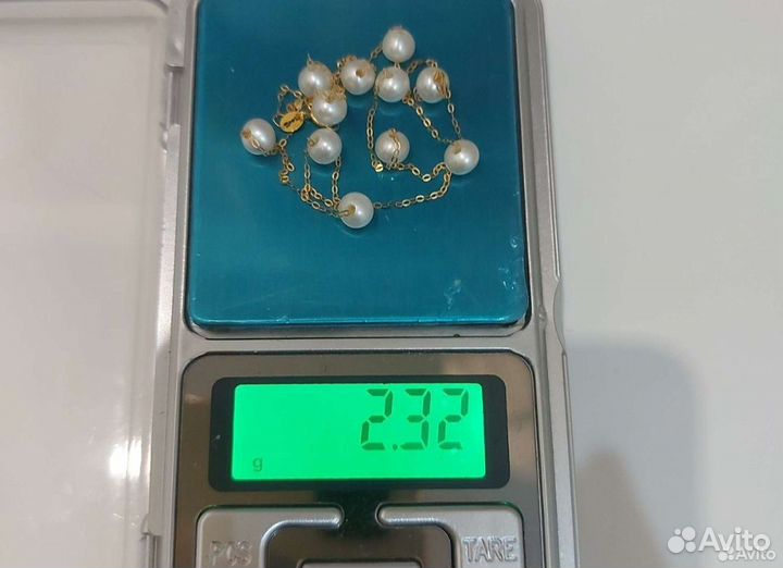 Золотое колье с жемчугом