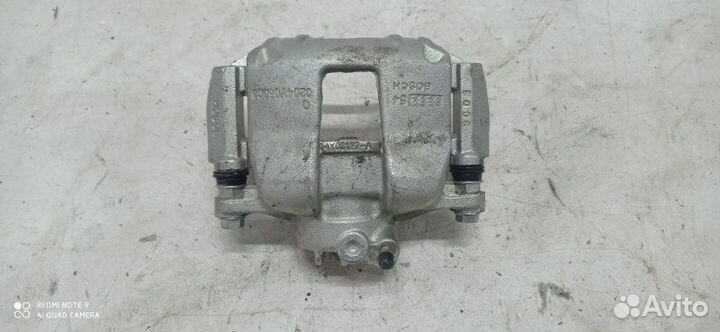 Суппорт тормозной задний левый Geely Emgrand EC7