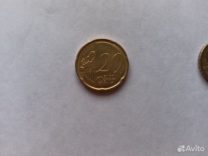 Монеты 20 центос и 10 центов евро