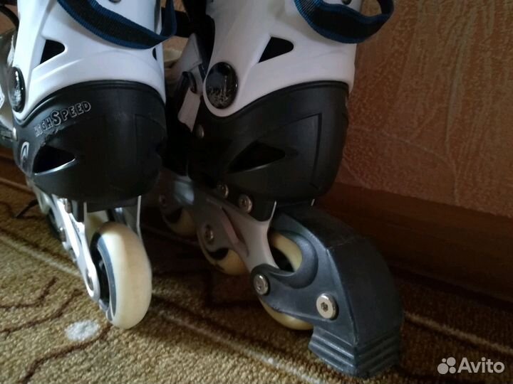 Коньки роликовые