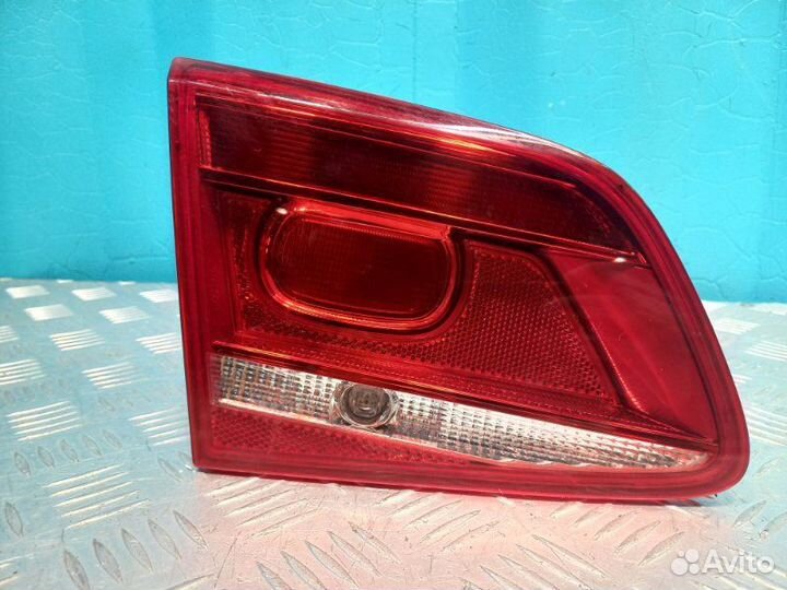 Фонарь крышки багажника левый Volkswagen Passat B7