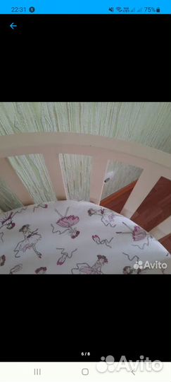 Детская кроватка с маятником