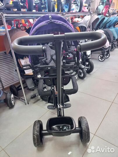 Трехколесный велосипед с ручкой