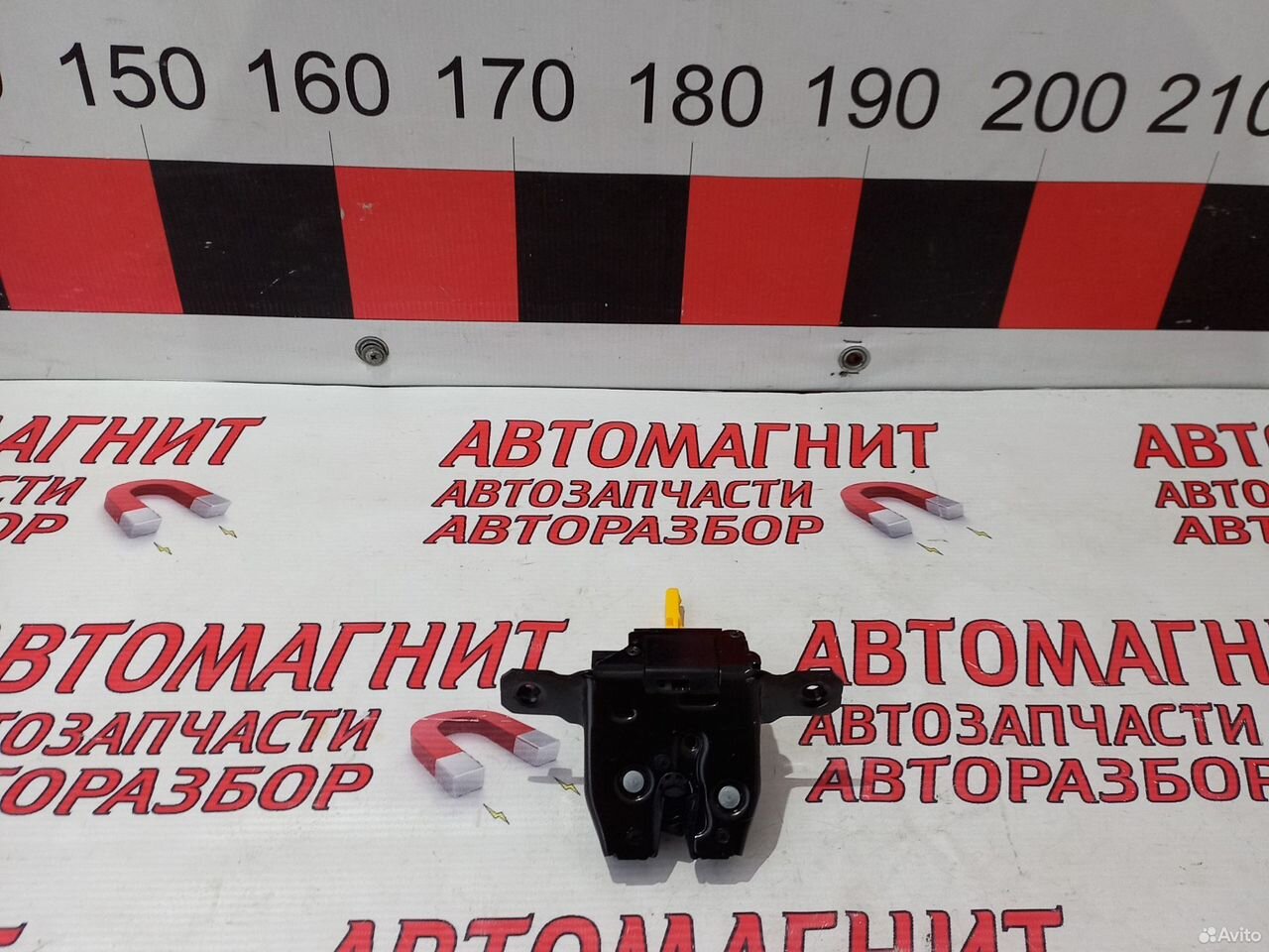 Замок крышки багажника Джили Кулрей SX11