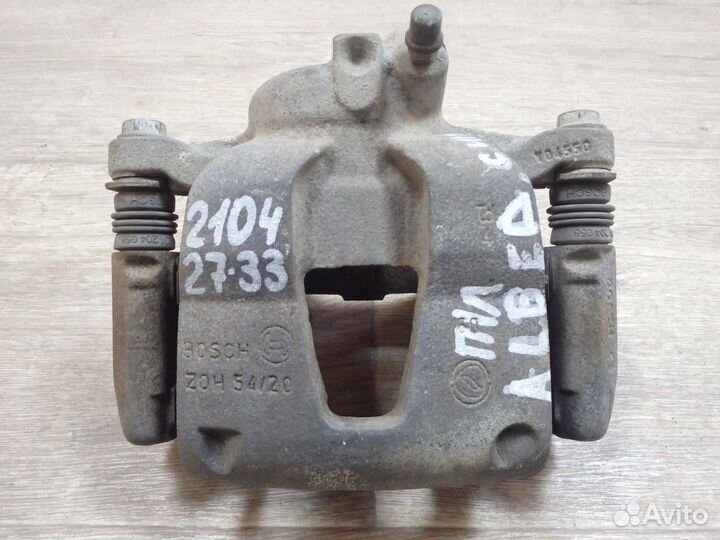 Суппорт тормозной передний левый Albea Альбеа