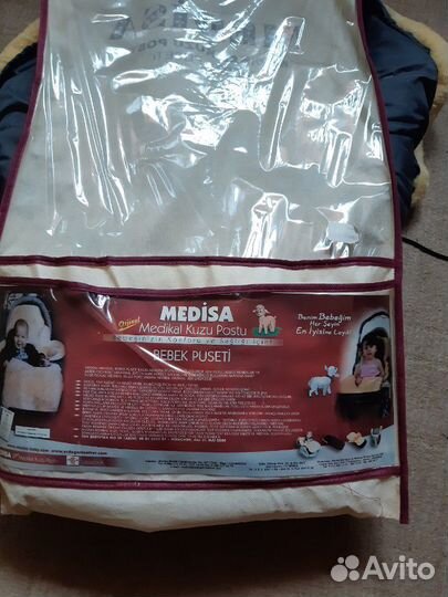 Зимний конверт из шкурки ягненка