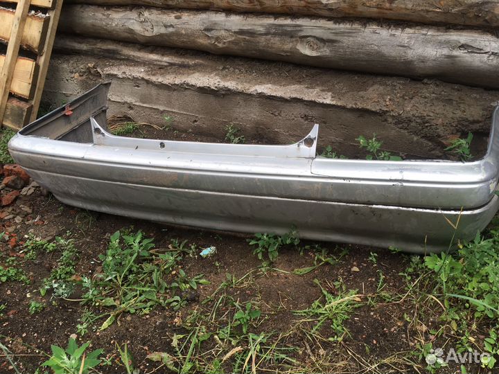 Задний бампер Toyota Carina AT211