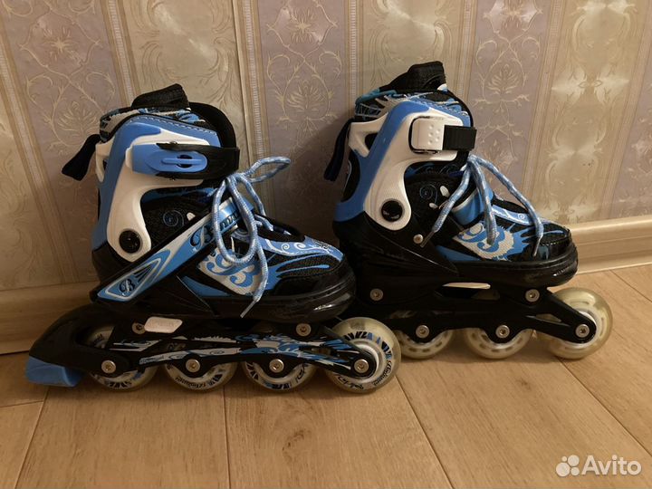 Роликовые коньки