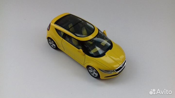 Cadillac, Skoda 1/43