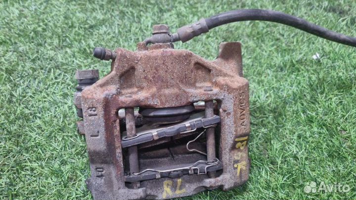 Суппорт тормозной задний левый Toyota Crown