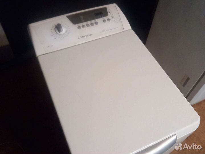 Стиральная машина с вертикальной загрузкой