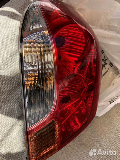 Фонарь задний левый mitsubishi outlander airtrek