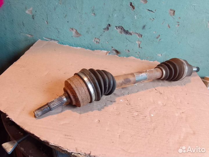 Привод левый Peugeot 206