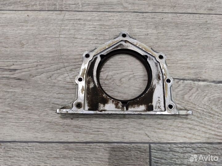 Крышка коленвала задняя Lancer Cedia