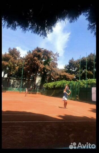 Тренер по большому теннису