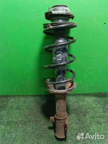 Стойка амортизатора передняя левая Suzuki Ignis 2